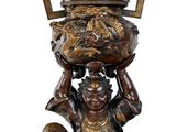 an image of a statue of a woman holding a bowl on her head