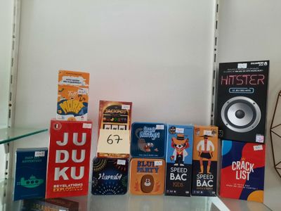 many books on the shelf in the room