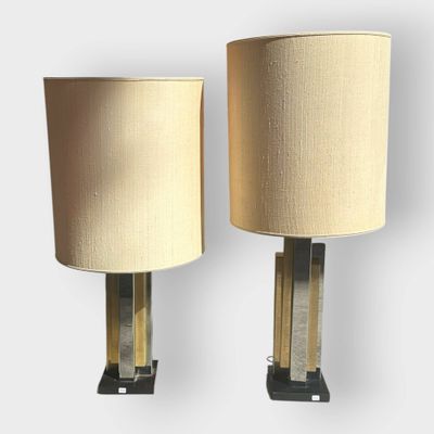 pair of brass and glass table lamps with lampshads on bases