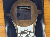 a clock that is on the wall of a room