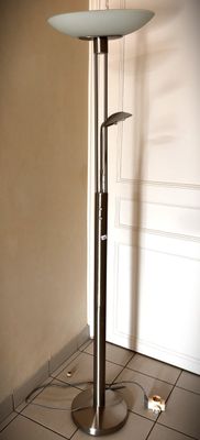 an image of a floor lamp in the corner of a room