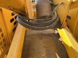 a close up view of a pipe in the back of a bulldozer