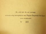 a close up of a book with a picture of a cat on it