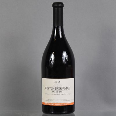 a bottle of wine that is sitting on a table