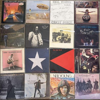 a lot of records that are on the floor