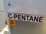 a sign that says opentane on the side of a machine