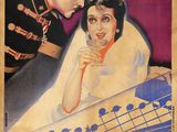 une vieille affiche de cinéma représentant un homme et une femme qui se regardent