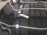 a close up of a car ' s hood with a sticker on it