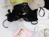 a lot of bras and underwear laid out on a table