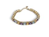 a close up of a bracelet on a white background