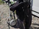 a bag of golf clubs and a bag of golf clubs on the ground