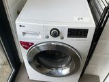 a washer and dryer in a small room