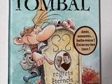 un livre sur lequel figure la photo d'un homme appuyé contre une pierre tombale