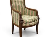 une chaise rembourrée avec un revêtement rayé, rembourrée, rembourrée, rembourrée, rembourrée, rembourrée, rembourrée, rembourrée