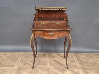 an old wooden desk with a drawer on top of it