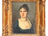 portrait of a woman in a blue dress with a gold frame