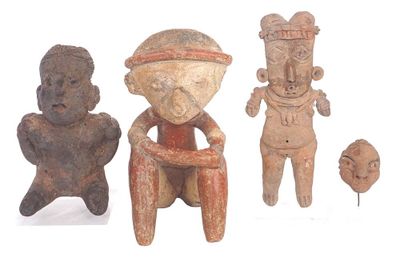 three figurines of different shapes and sizes are displayed on a white surface