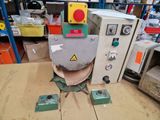 a machine that is sitting on a table in a warehouse