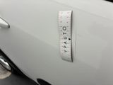 a sticker on the door of a white car