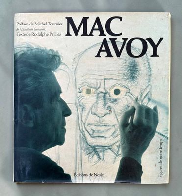 an old book with a drawing of a man ' s face on it