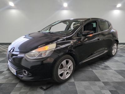 a picture of a black car parked in a garage