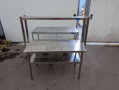 an image of a stainless steel shelf with two shelves on it