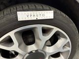 a close up of a tire with a sticker on it