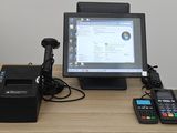 an image of a desk with a computer and a printer on it