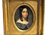portrait of a woman in a black dress in a gold frame