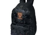 a black backpack with a red eagle on it