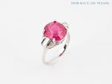a pink tourmaline and diamond ring set in 18k white gold