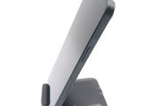 a close up of a cell phone on a stand