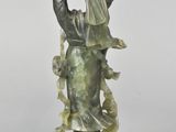 an image of a statue of a woman holding a vase