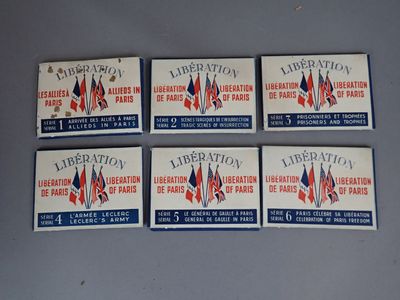 six vintage french library cards with flags on them sitting on a table