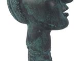 statue of a head of a dog with a hat on it ' s head