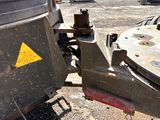 an image of a tow truck with a yellow triangle on the front