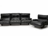 black leather sofa and recliner set on a white background