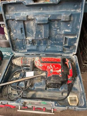 a tool in the case that is sitting on the floor