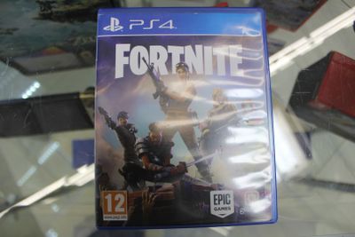 a video game on a glass table in a store