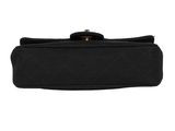 a black purse with a gold clasp on it