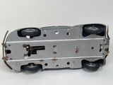 a toy train that is sitting on a white surface