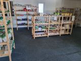 a room with shelves and shelves filled with food