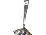 a spoon that has a tag on it