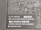 a close up of a laptop battery on a table
