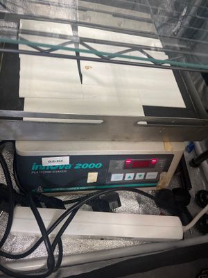 a machine that is sitting inside of a glass case