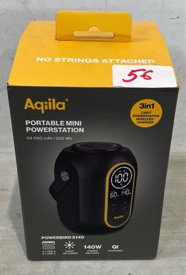 une boîte contenant un réveil noir et jaune