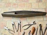 a lot of tools that are laying out on the floor