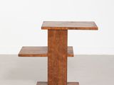 an image of a wooden table with a shelf on top of it