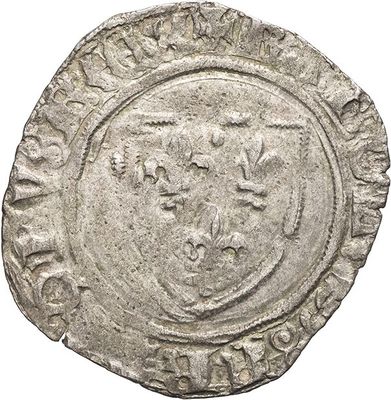 an old silver coin with a lion on it