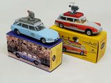 three toy cars that are sitting on top of a box